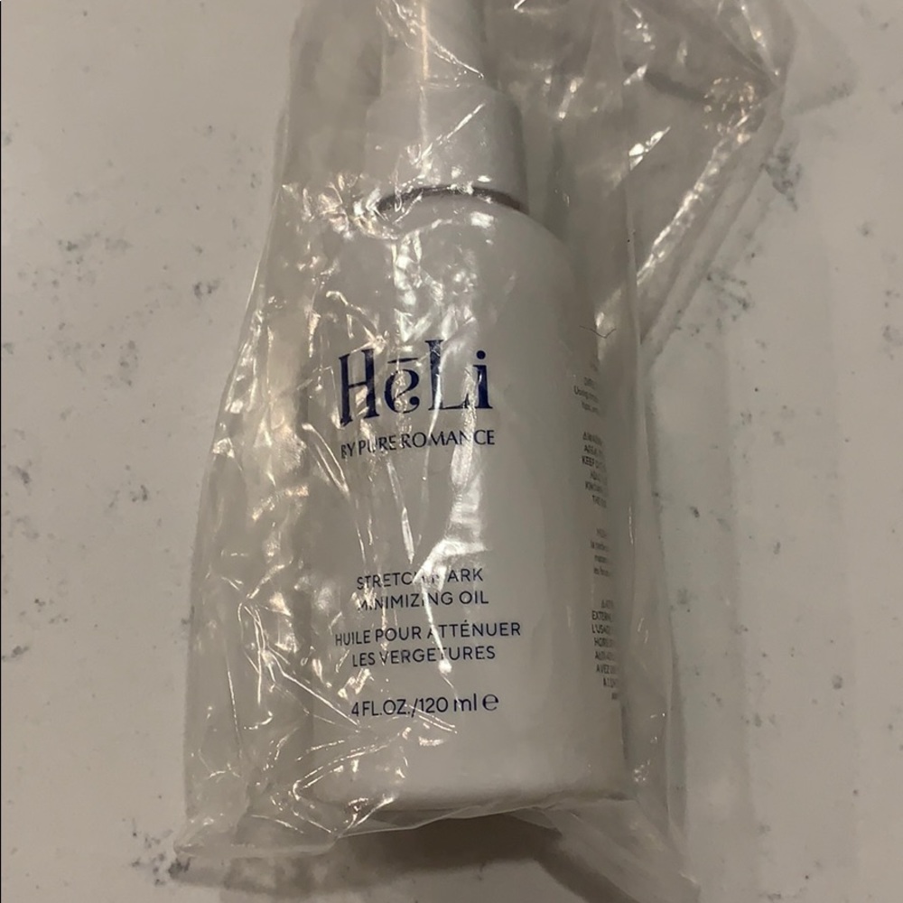 Heli stretch mark minimizing oil